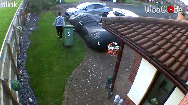 Hilarious moment: Storm sends dustbin lid flying into man’s face