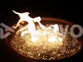 A fire burns at night in 120p super slow motion