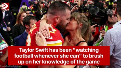 Taylor Swift has been "watching football whenever she can" to brush up on her knowledge of the game