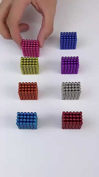 The tiny magnetic balls perfectly attach to each other. #asmr #satisfying #shrots