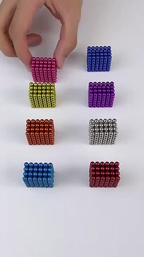 The tiny magnetic balls perfectly attach to each other. #asmr #satisfying #shrots