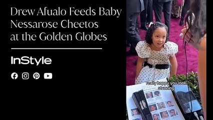 Drew Afualo Feeds Baby Nessarose Cheetos at the Golden Globes