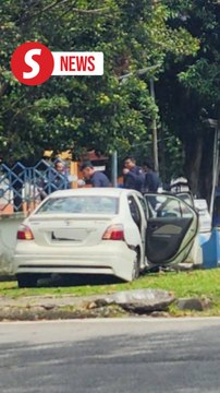 Driver injured after vehicle crashes into Jinjang police station wall