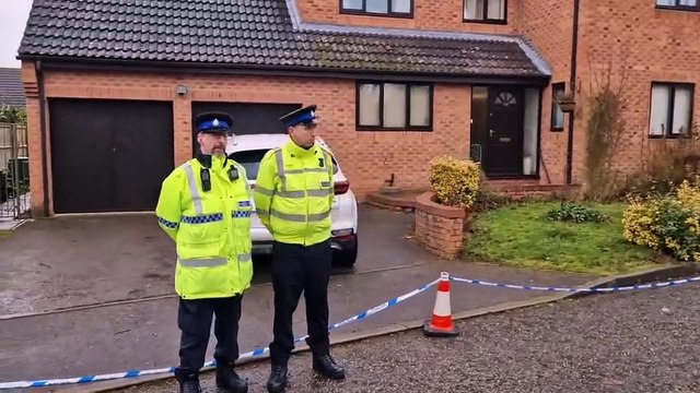 Police at murder scene in Peterborough