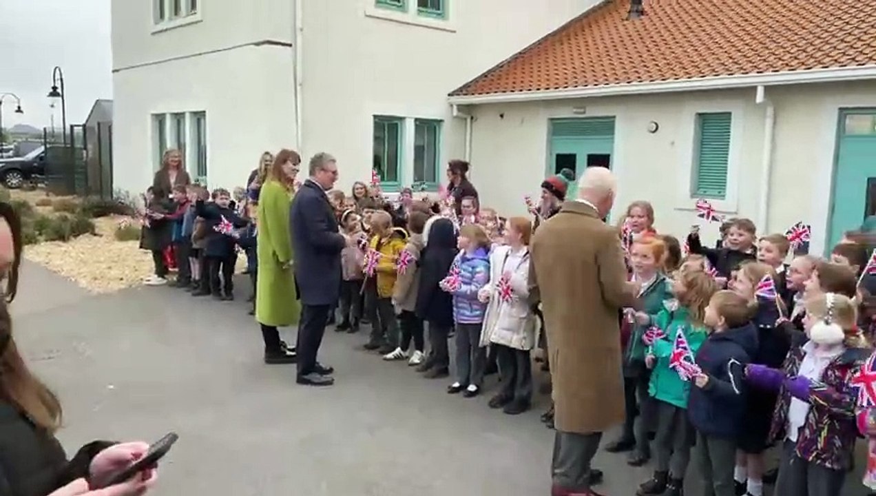 King Charles III, Keir Starmer and Angela Rayner greeted by schoolchildren at Nansledan