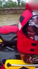 Medical evacuation rescuers navigate swollen river with drones