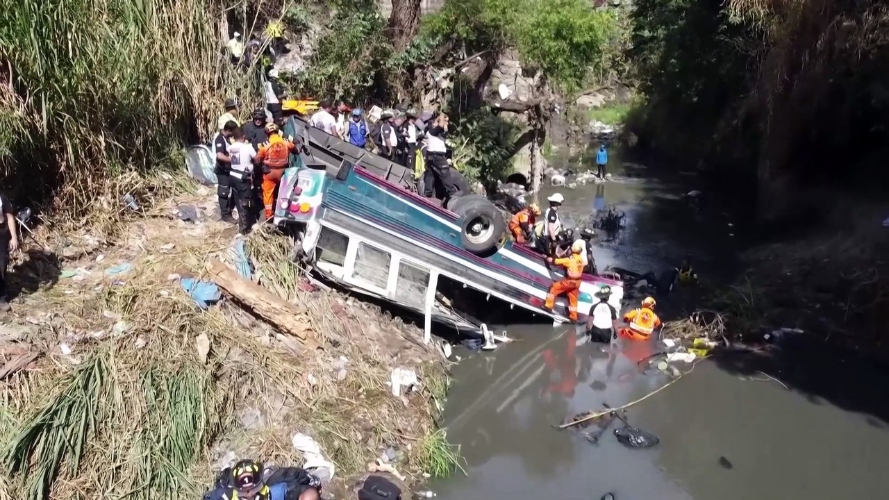 At least 50 dead after bus plunges off bridge in Guatemala