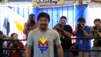 Filipino boxing icon Manny Pacquiao charms media
