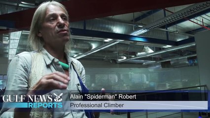 Alain 'Spiderman' Robert scales the Cayan Tower in Dubai