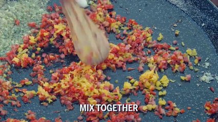 Celebrity DJ John Jacobsen mixes a mean seafood paella - GN Guides