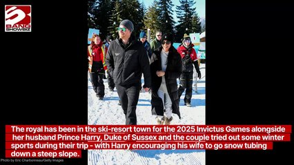 Meghan, Duchess of Sussex tries snow tubing