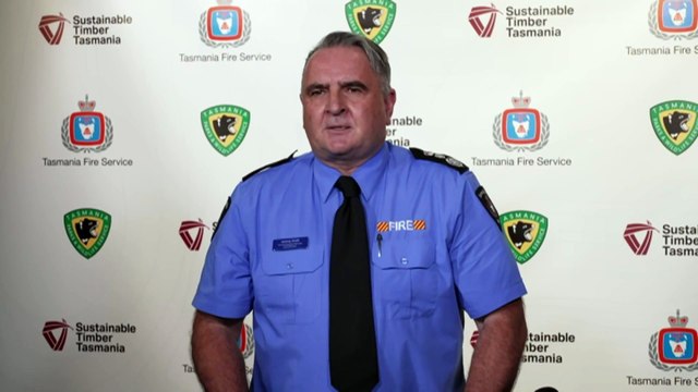 Tasmania’s west coast firefighters brace for strong winds as blazes continue to ravage 50,000 hectares of wilderness