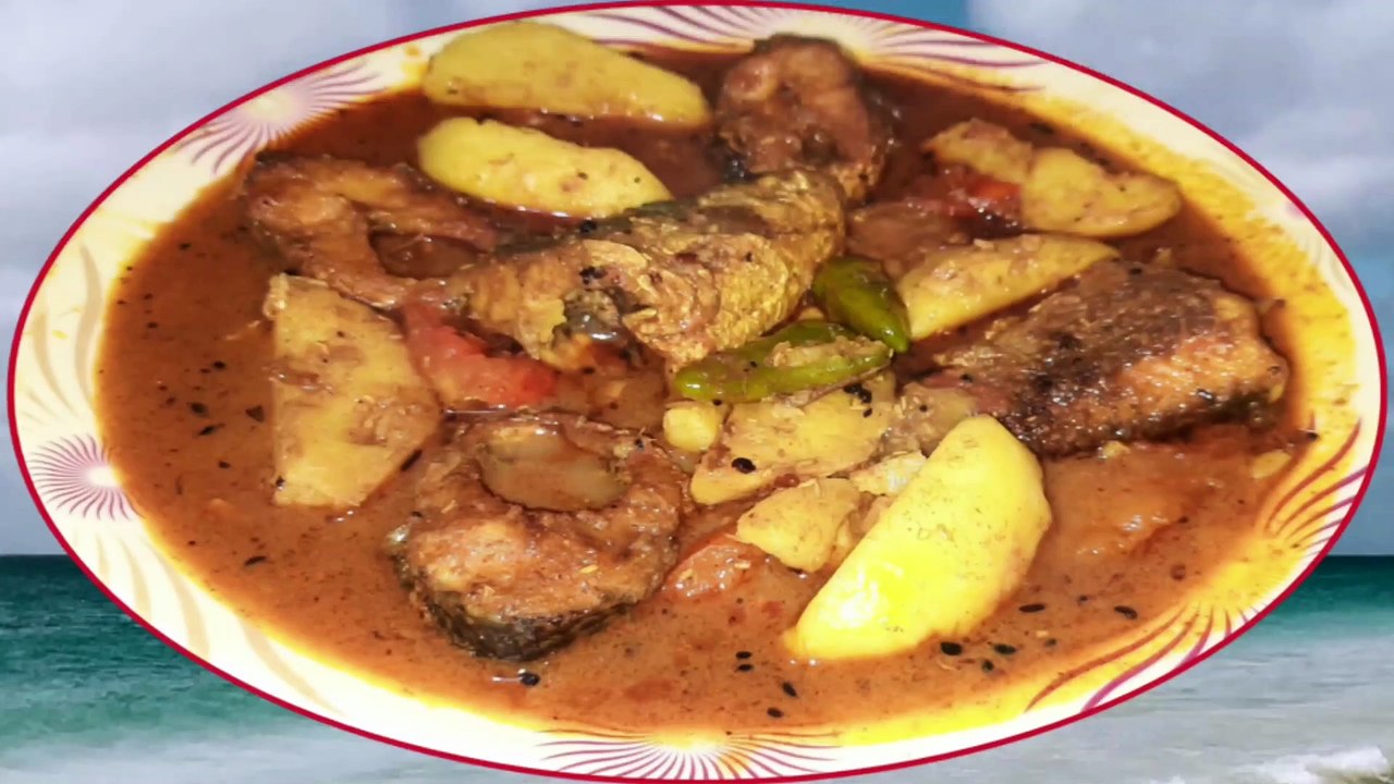 Mrigel fish curry, how to cook Mrigel fish, Bengali mustard fish, best fish curry recipe, authentic Bengali fish dish, mustard fish gravy, spicy fish recipe, homemade Bengali food