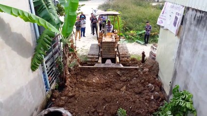 Completed Project with Bulldozer & 5T Truck pushing soil on flooded land size 5mX20m to create  home_019