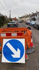 Christmas decorations adorn a sinkhole on Parklands Road which remains in disrepair