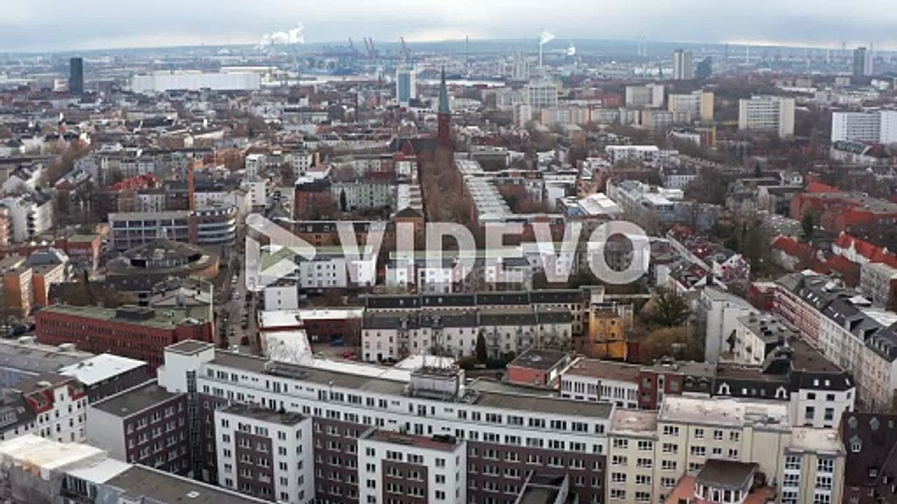 Aerial view of houses in residential neighborhoods and old church in Hamburg city center