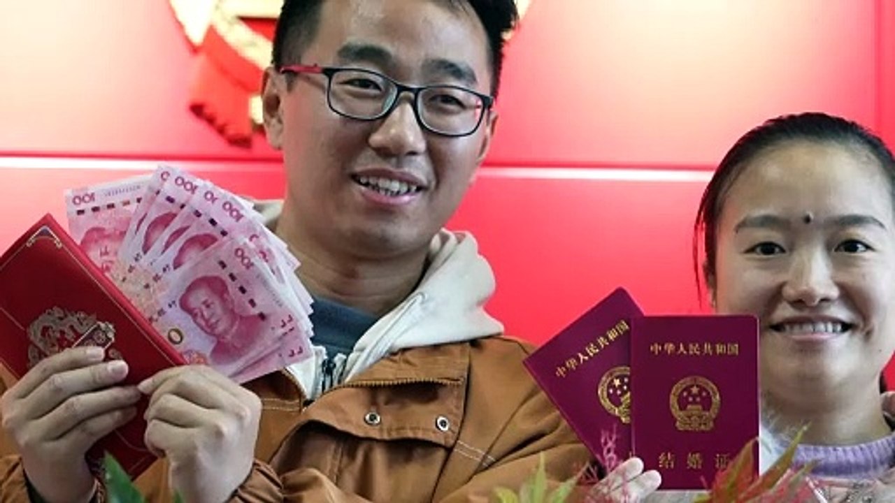 China offers cash rewards to newlyweds in an ef...