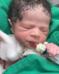 Newborn feeding himself and acting so independent!