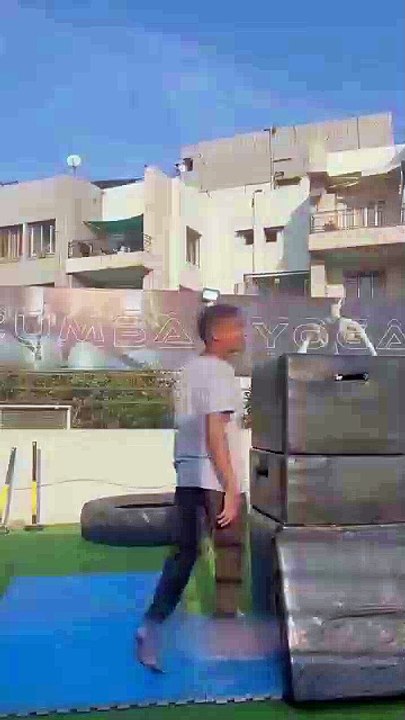 Guy Jumps Over High Stack Gym Boxes