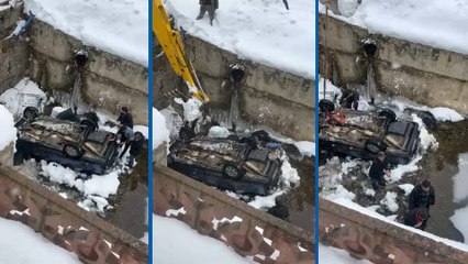 Dereye uçan otomobilde can pazarı; kurtarma anları kamerada