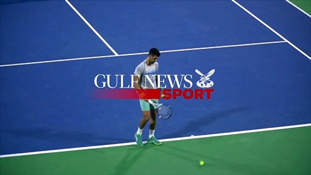 Novak Djokovic practices on Center Court at the Dubai Tennis Stadium