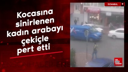 İstanbul'da kocasına sinirlenen kadın, arabayı çekiçle pert etti
