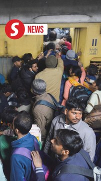 At least 15 dead in India stampede to catch trains to Hindu mega-festival