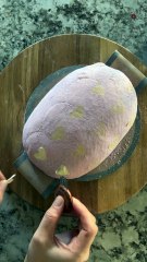 Special Valentine's Day sourdough loaf scored with colorful heart patterns for a festive touch