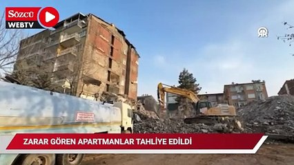 Ağır hasarlı bina yıkılırken yandaki apartmana zarar verdi