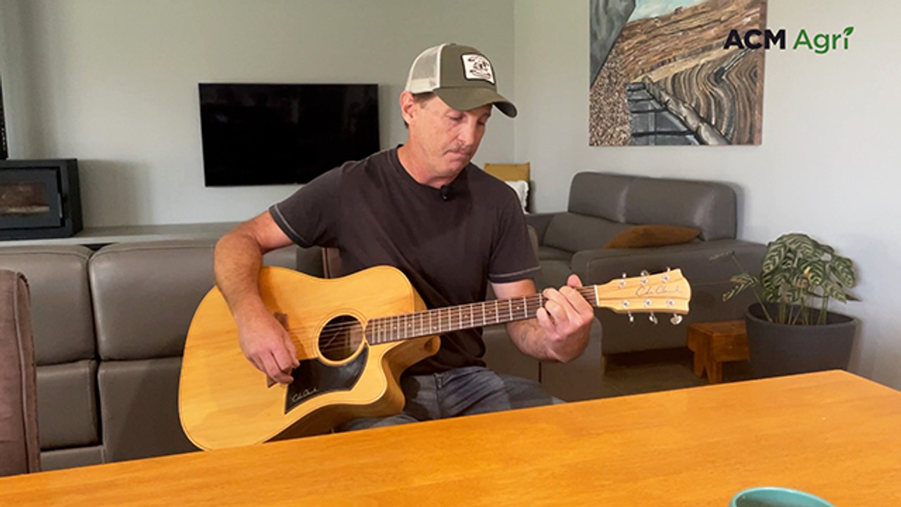 Andrew Lange performs original song The Land