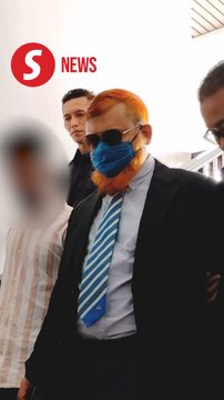 University lecturer charged with sexually assaulting two male students