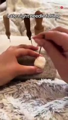 Artist makes a wool cow car freshener with needle felting