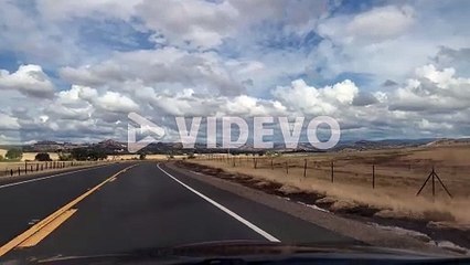 driving down a rural country road