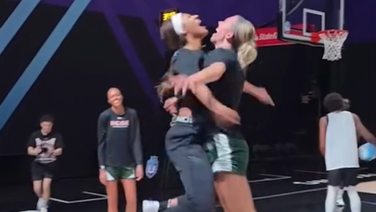Lexie Hull's chest bump celebration with Angel Reese