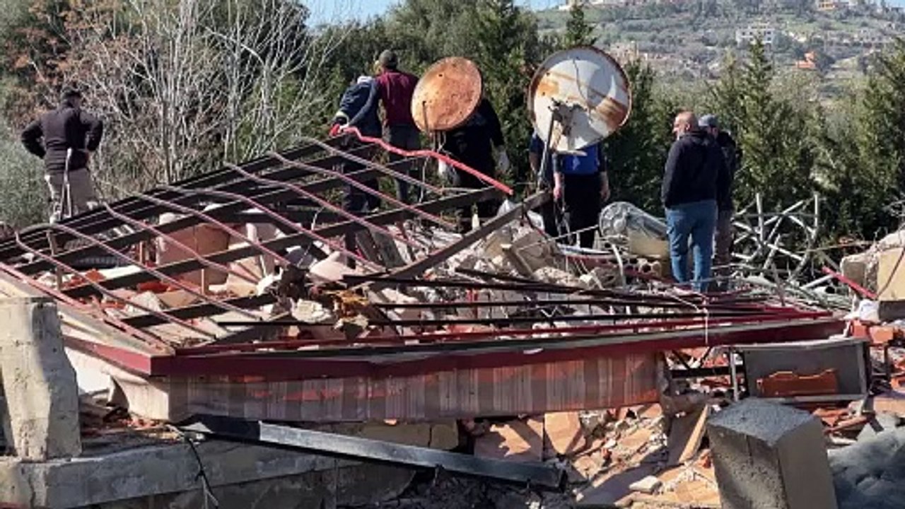 Lebanese return to destruction in border village after Israeli forces withdraw