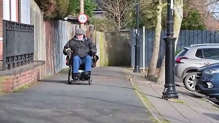 Electric wheelchair user fears being tipped over on footpath in Market Drayton