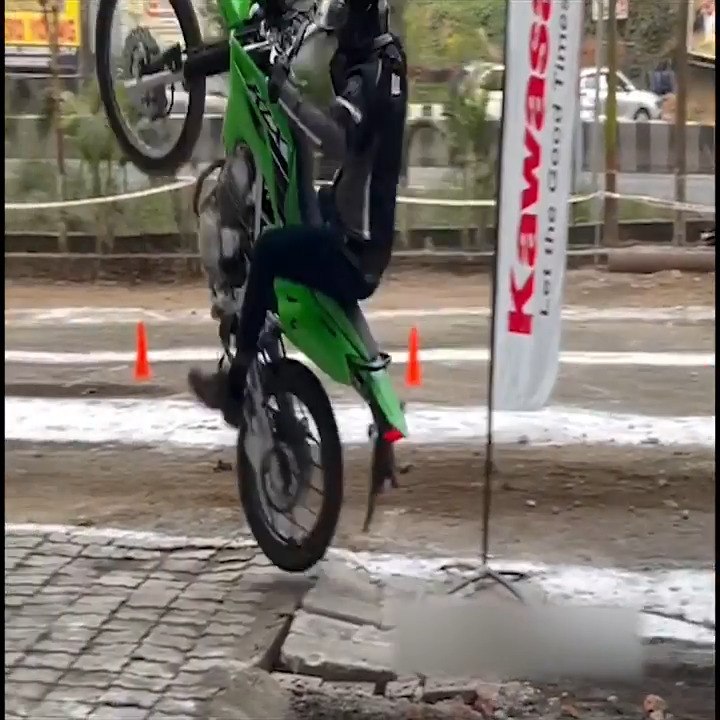 Biker Crashes While Attempting Wheelie