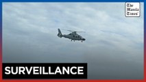 Chinese navy helicopter flies near Philippine plane carrying journalists