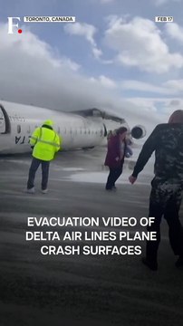 WATCH_ Passengers Evacuate From Upside-Down Delta Air Plane