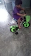 Little Boy Enthusiastically Riding His Bicycle in the Courtyard | Heartwarming Moment"