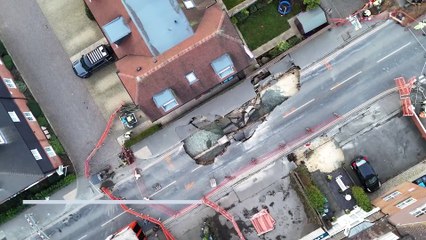 Large sinkhole forces closure of  Surrey hughstreet after burst pipe