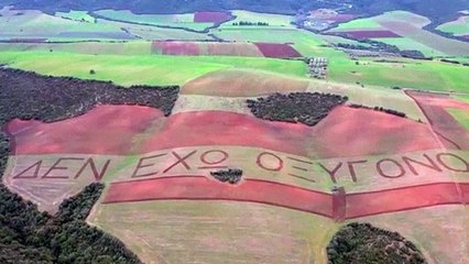 Huge field message demands justice for Greek train crash victims