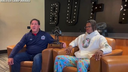 Travis Hunter receives player of the year trophy from Walter Camp Foundation
