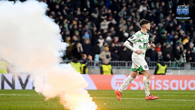 Rival Slovenian and Bosnian fans throw FLARES at each other in chaotic Conference League scenes, with match suspended for 19 minutes