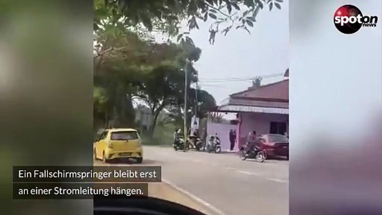 Bruchlandung: fallschirmspringer rammt frau von motorrad