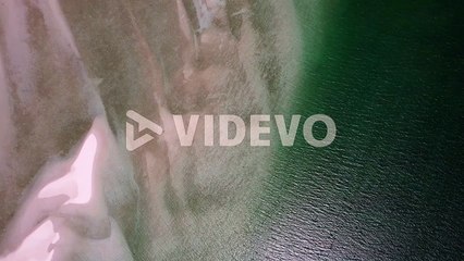 beautiful aerial top down of white sand beach