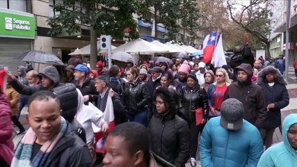 Inmigrantes protestan en Chile en contra de políticas migratorias de Piñera