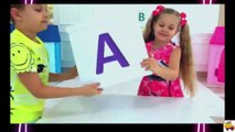 Diana and Roma learn the ABC song and the alphabet.