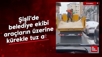Şişli'de belediye ekibi araçların üzerine kürekle tuz attı