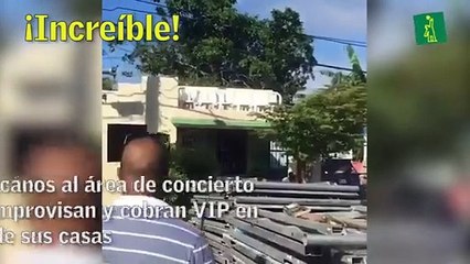 Improvisan VIP en techos de casas para ver a Romeo Santos